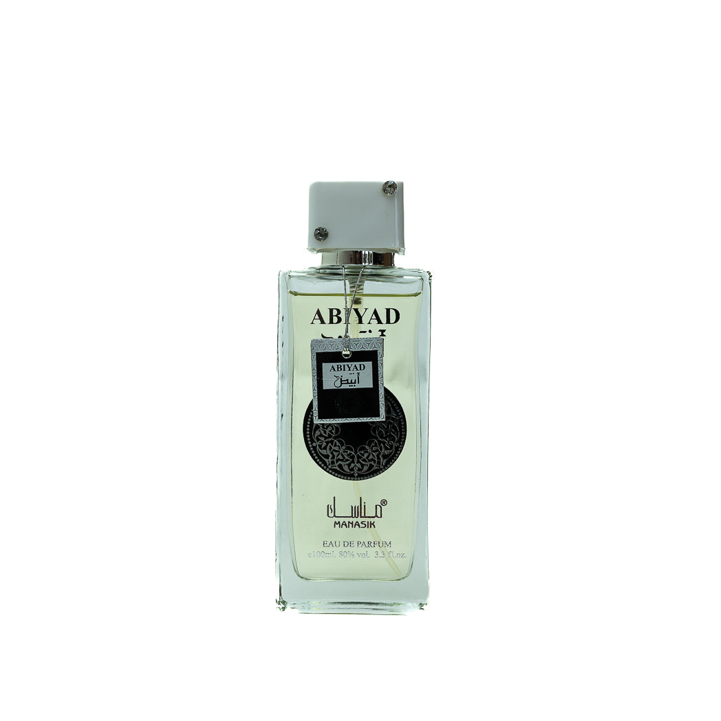 Experience the invigorating scent of Abiyad Manasik Eau de Parfum for men. This 100ml fragrance combines fresh citrus and warm musk for a sophisticated and lasting aroma.