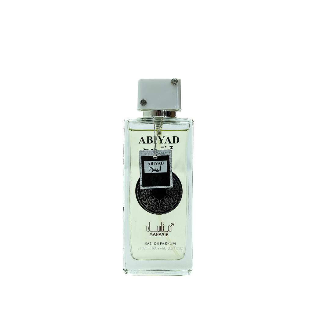 Experience the invigorating scent of Abiyad Manasik Eau de Parfum for men. This 100ml fragrance combines fresh citrus and warm musk for a sophisticated and lasting aroma.